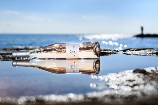 Minuty de Minuty Provence Rose Wine Bottle laid flat and chilling in the Mediterranean Sea