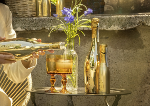 Bottega Gold Premium Prosecco Signature Gold Bottles being poured into luxury glassware