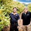 Deakin Estate Vineyard, Victoria, Australia - Wine makers standing amongst the vines